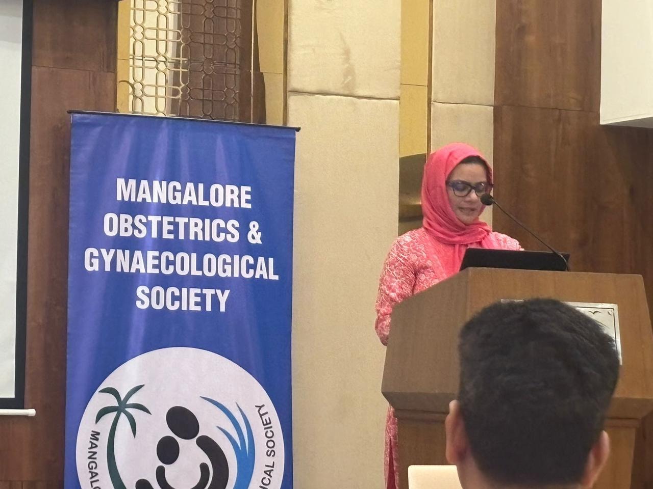 Dr. Mariam Anjum — MOGS — At the Podium